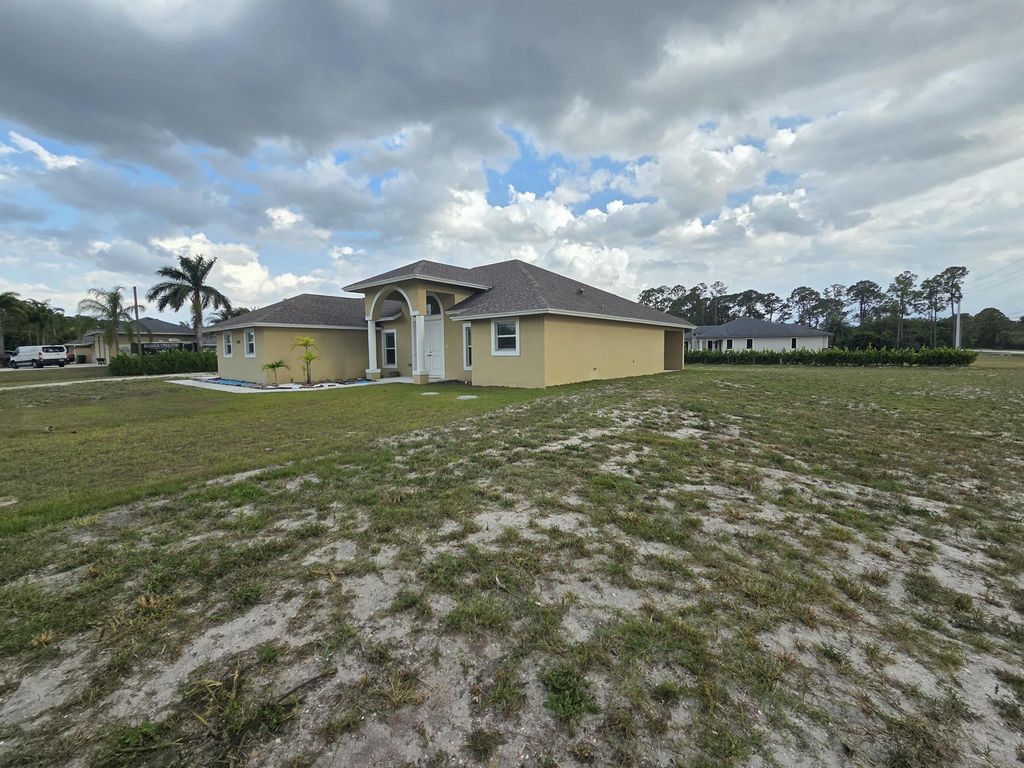 Photo of 17476 Valencia Boulevard, The Acreage, FL 33470 (MLS # R11079641)
