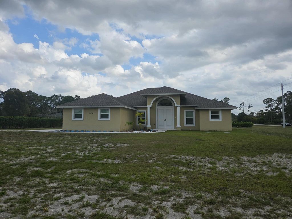 Photo of 17476 Valencia Boulevard, The Acreage, FL 33470 (MLS # R11079641)