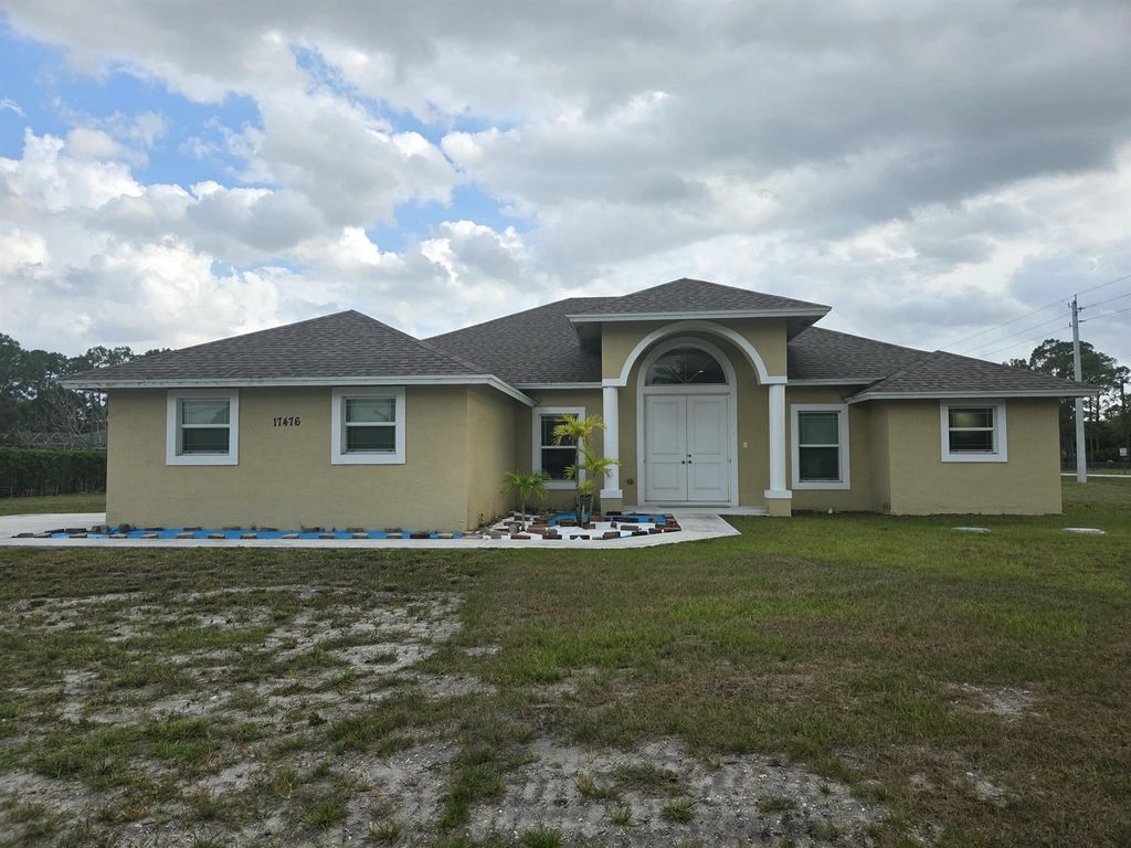 Photo of 17476 Valencia Boulevard, The Acreage, FL 33470 (MLS # R11079641)
