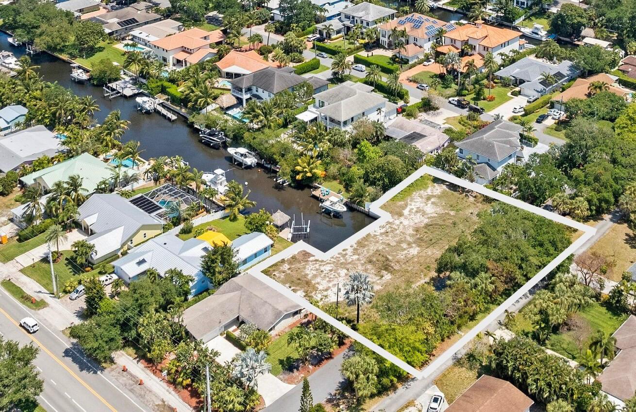 Exquisite Waterfront Lot Spanning .64 Acres in the Heart of Palm Beach Gardens. Tucked Away at the End of a Generous Canal, Offering Long Water Views. With Direct Ocean Access, No Fixed Bridges, and a Freshly Installed Seawall in 2022, This Property Exudes Coastal Charm. While Currently subdivided, These Lots Can Effortlessly Merge into One Expansive Property. Ideal for Building Your Dream Home, This Opportunity Ensures Abundant Yard Space and the Ultimate in Waterfront Living.