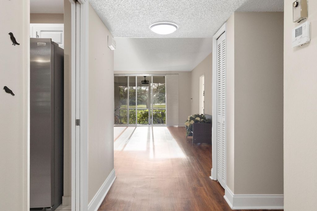 Photo of 3499 Oaks Way #105, Pompano Beach, FL 33069 (MLS # B26034469)