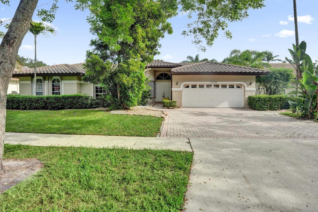 Photo of 10255 GUATEMALA Street, Cooper City, FL 33026 (MLS # B26071174)
