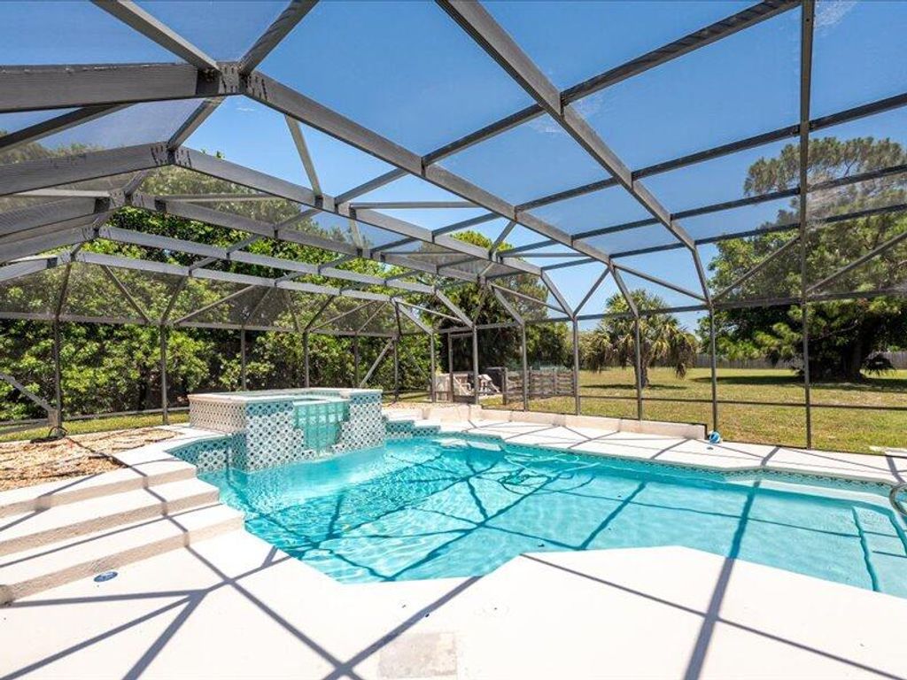 Photo of 1821 SE Hanby Avenue, Port Saint Lucie, FL 34952 (MLS # R11069178)