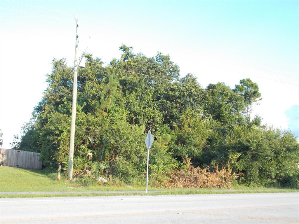 Photo of 1858 SW California Boulevard, Port Saint Lucie, FL 34953 (MLS # R10731627)