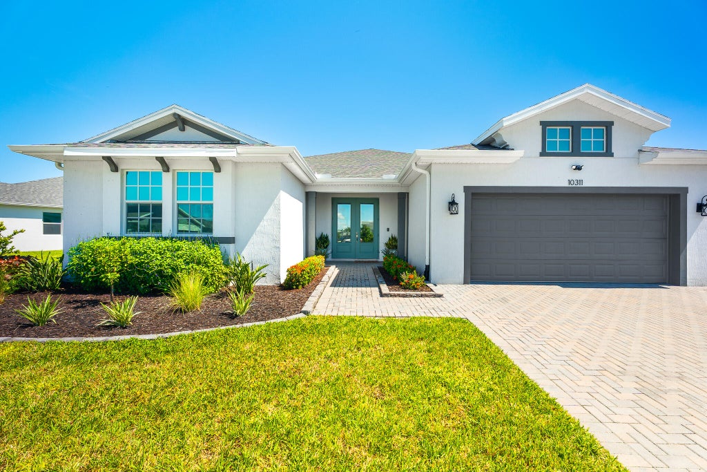 Photo of 10311 SW Orana Drive, Port Saint Lucie, FL 34987 (MLS # B26076125)