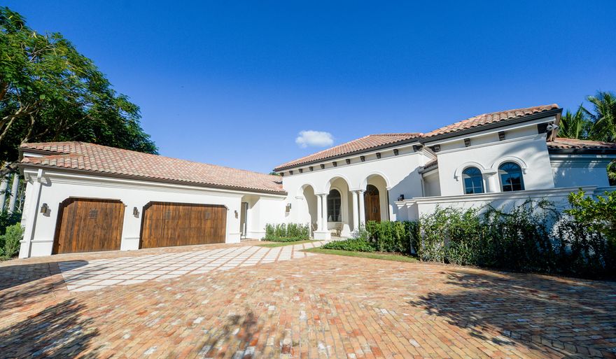 Location location location. Equestrian Club Estate home newly renovated with impact glass and solid mahogany entry doors. This spacious 4 bedroom/5 full bath/2 half bath home offers luxurious living for all. Relax by the sparkling new pool surrounded by Bermuda grass and a fully equipped summer kitchen. All of this, just steps from the horse show. There is not a finer luxury home for the discerning equestrian, desiring space, privacy, and security!