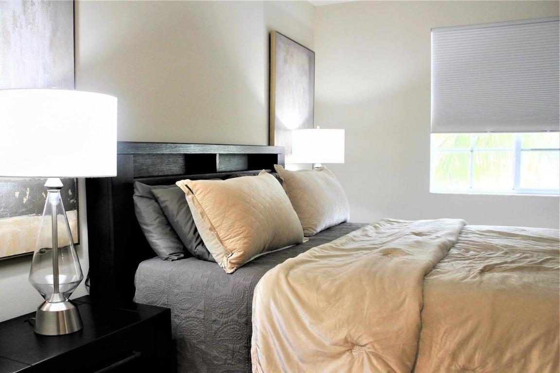 PINEAPPLE GROVE VILLAGE CONDO - Residential Lease