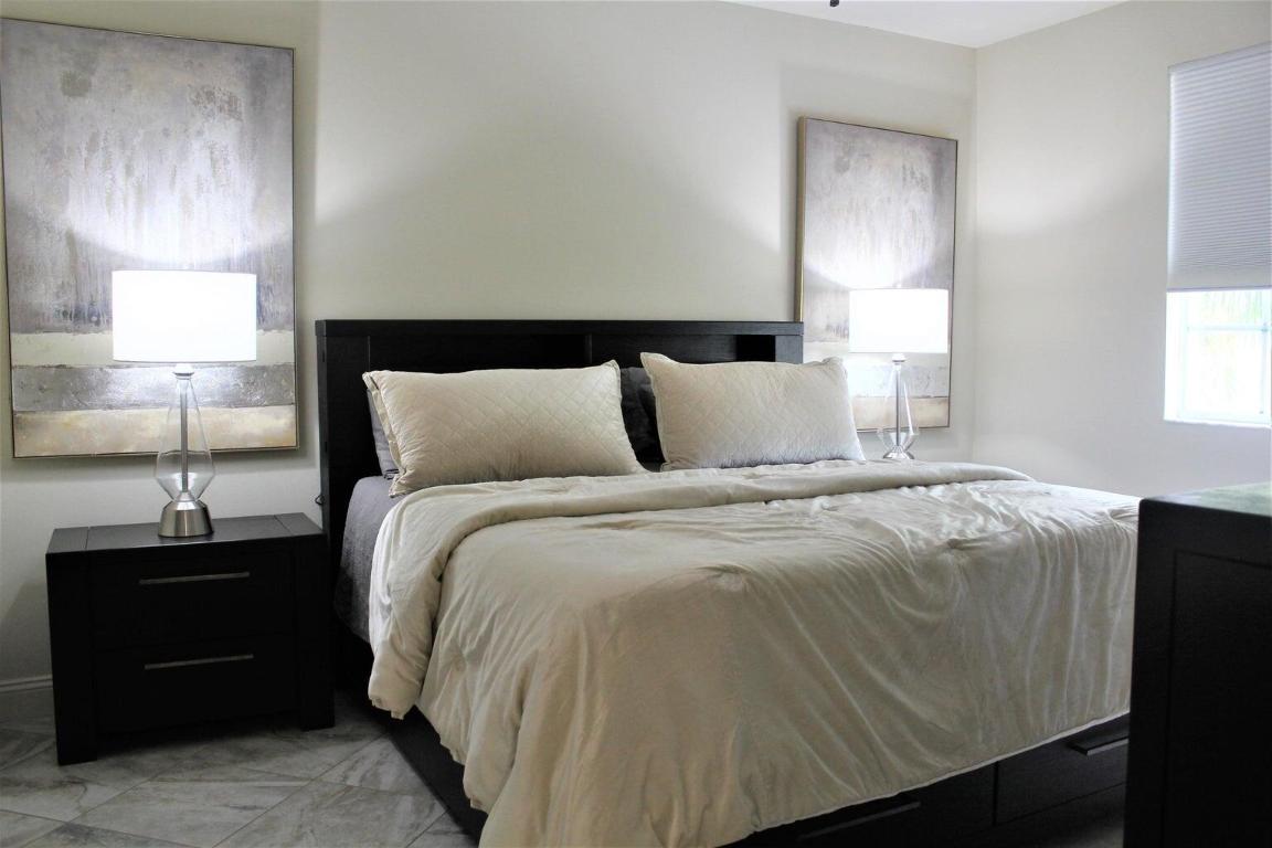 PINEAPPLE GROVE VILLAGE CONDO - Residential Lease