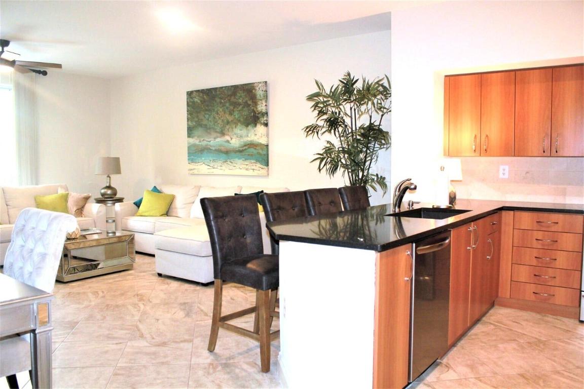 PINEAPPLE GROVE VILLAGE CONDO - Residential Lease