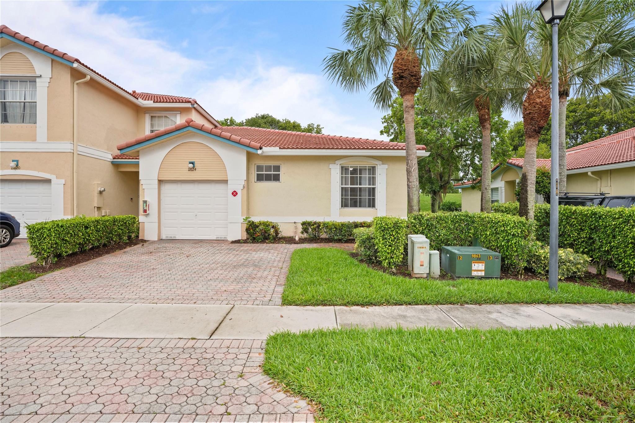 Welcome to this beautifully updated 3-bedroom, 2-bath villa in the highly desirable Pelican Pointe at Wyndham Lakes. This move-in-ready home offers comfort, style, and peace of mind with a new roof, newer A/C and water heater, new bedrooms laminated flooring, and exterior maintenance included through the HOA. Great Master insurance coverage so you can have HO6 (low insurance). Full hurricane protection and no Flood insurance needed. Inside, you'll find high ceilings, spacious bedrooms, and a primary suite with dual walk-in closets. The kitchen and bathrooms have been tastefully remodeled, with space for a cozy coffee bar or eat-in area. Enjoy serene garden views from your private patio, perfect for morning coffee and relaxing evening. PRICED TO SELL, don't miss out!!