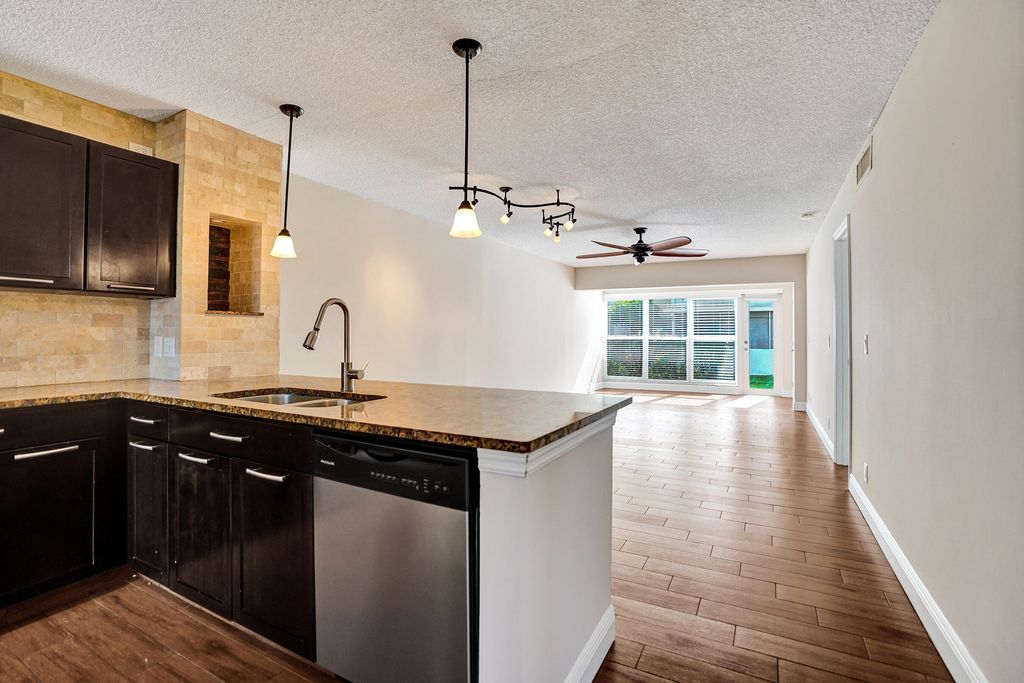 Photo of 1140 Boxwood Drive #102, Delray Beach, FL 33445 (MLS # B26015835)