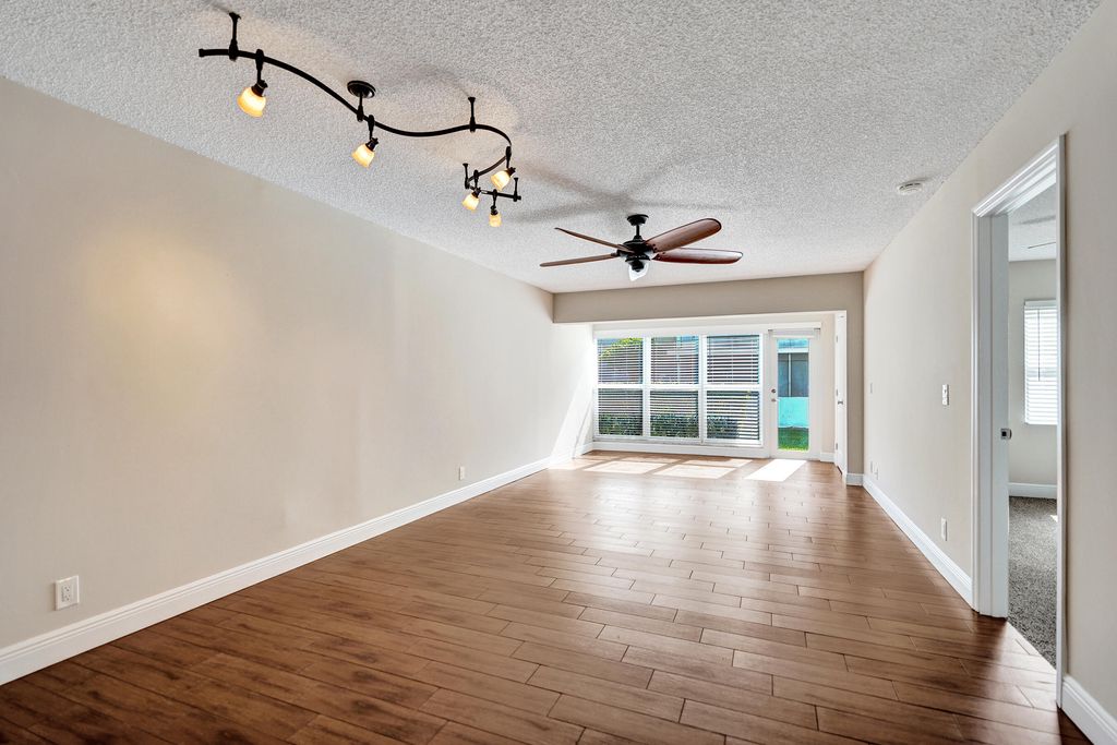 Photo of 1140 Boxwood Drive #102, Delray Beach, FL 33445 (MLS # B26015835)