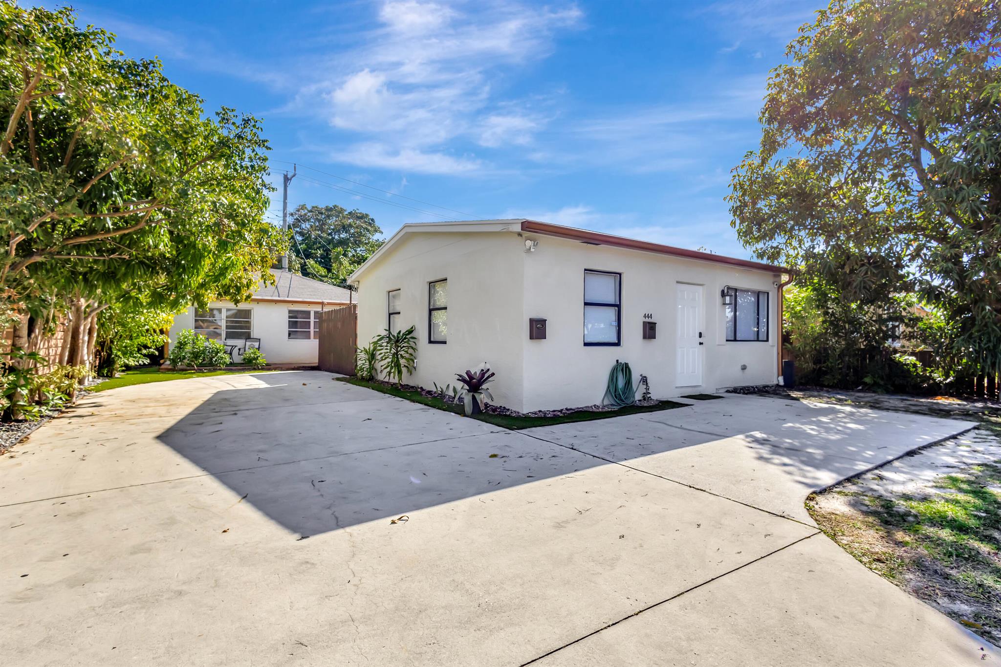 Located in the desirable South of Southern (SoSo) neighborhood, this property offers two fully renovated homes on one lot. The rear home features three bedrooms and two bathrooms, while the front home includes two bedrooms and one bathroom. The front home is currently operating as an Airbnb, previously generating $6,500 per month. The property is now transitioning to annual leases, with projected rental income of $4,500 per month for the rear home and $3,000 per month for the front home.Both homes have roofs replaced in 2017, along with new hot water heaters and central AC systems. They are fully furnished, and impact windows have been ordered and will transfer to the buyer upon installation. This is a prime investment opportunity in one of the most sought-after neighborhoods,