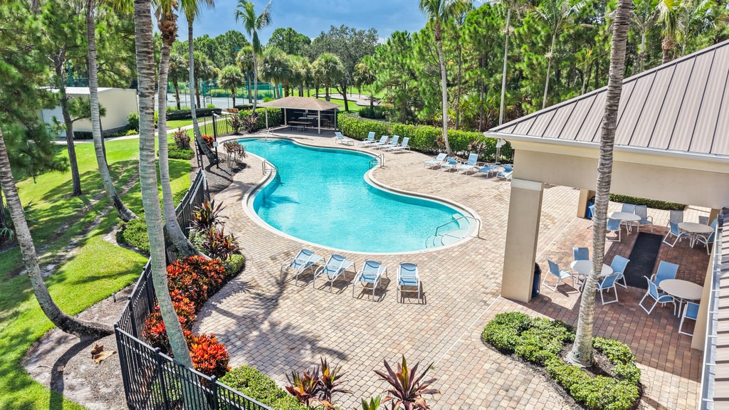 Photo of 6074 SW BALD EAGLE Drive, Palm City, FL 34990 (MLS # B26070929)