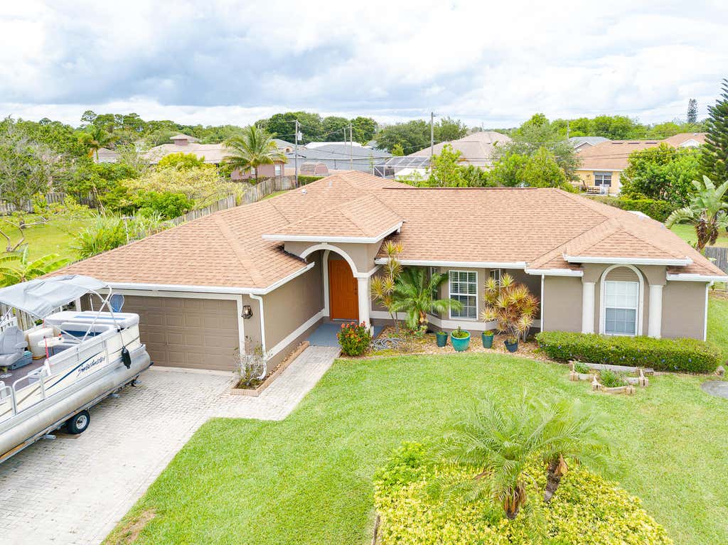 Photo of 929 SW Mccall Road, Port Saint Lucie, FL 34953 (MLS # R10727075)