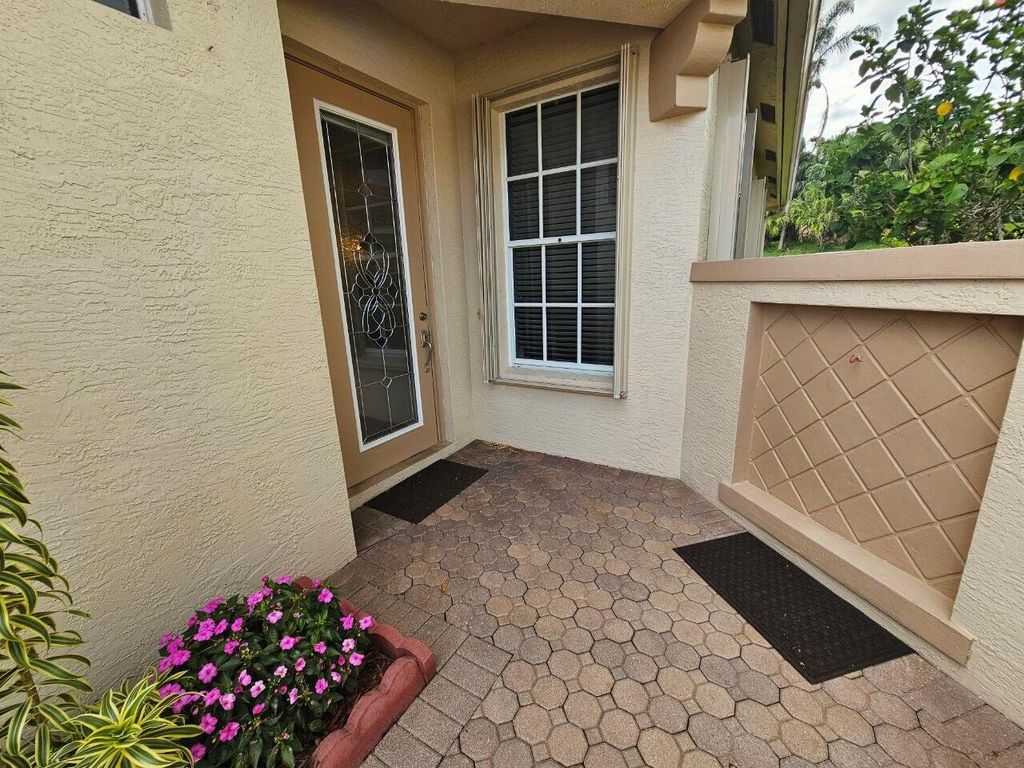 Photo of 660 SW Treasure Cove, Port Saint Lucie, FL 34986 (MLS # R11009135)