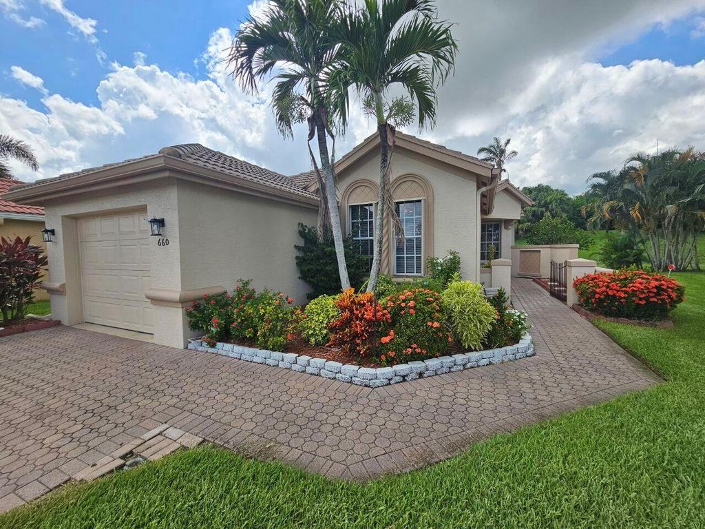 Photo of 660 SW Treasure Cove, Port Saint Lucie, FL 34986 (MLS # R11009135)