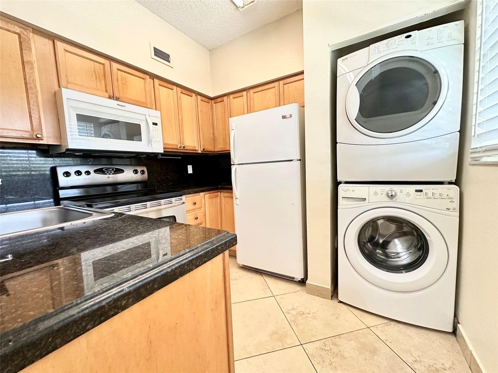 Photo of 621 Cypress Lake Boulevard #B, Deerfield Beach, FL 33064 (MLS # F10505968)