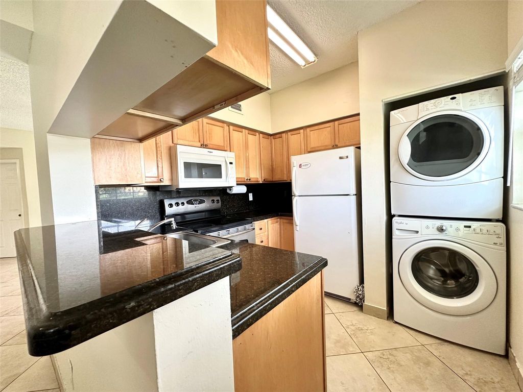 Photo of 621 Cypress Lake Boulevard #B, Deerfield Beach, FL 33064 (MLS # F10505968)