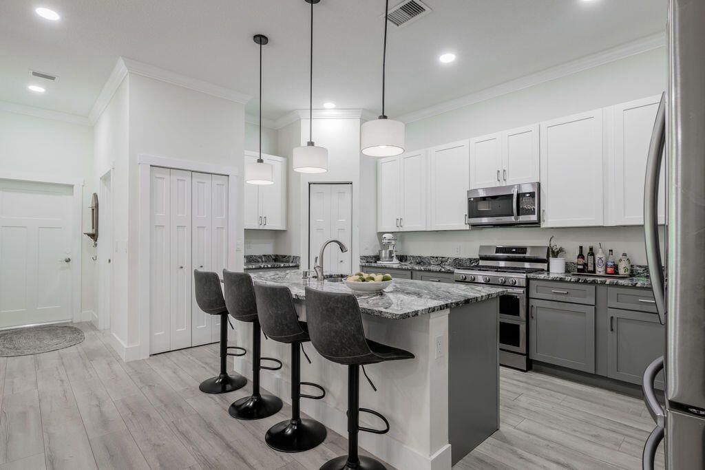 Photo of 1155 SW Bent Pine Cove, Port Saint Lucie, FL 34986 (MLS # R11147536)