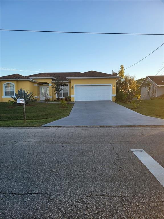 Photo of 232 SW Carter Ave, Port Saint Lucie, FL 34983 (MLS # F10316401)
