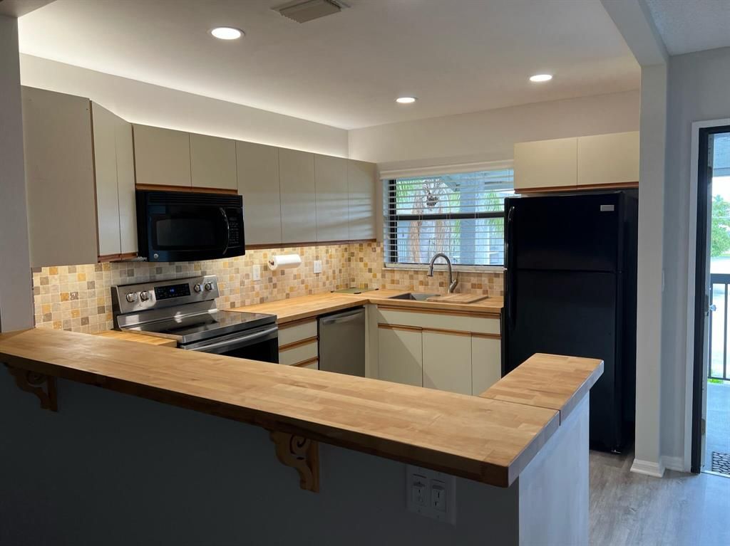 Photo of 1200 SE Parkview Place #F-8, Stuart, FL 34994 (MLS # R10878695)