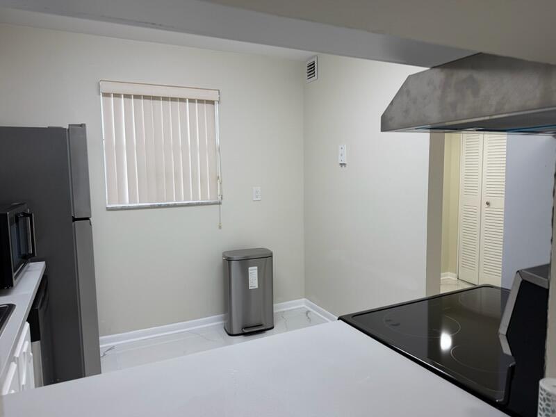 Photo of 3000 Riverside Drive #201-1, Coral Springs, FL 33065 (MLS # B26037829)