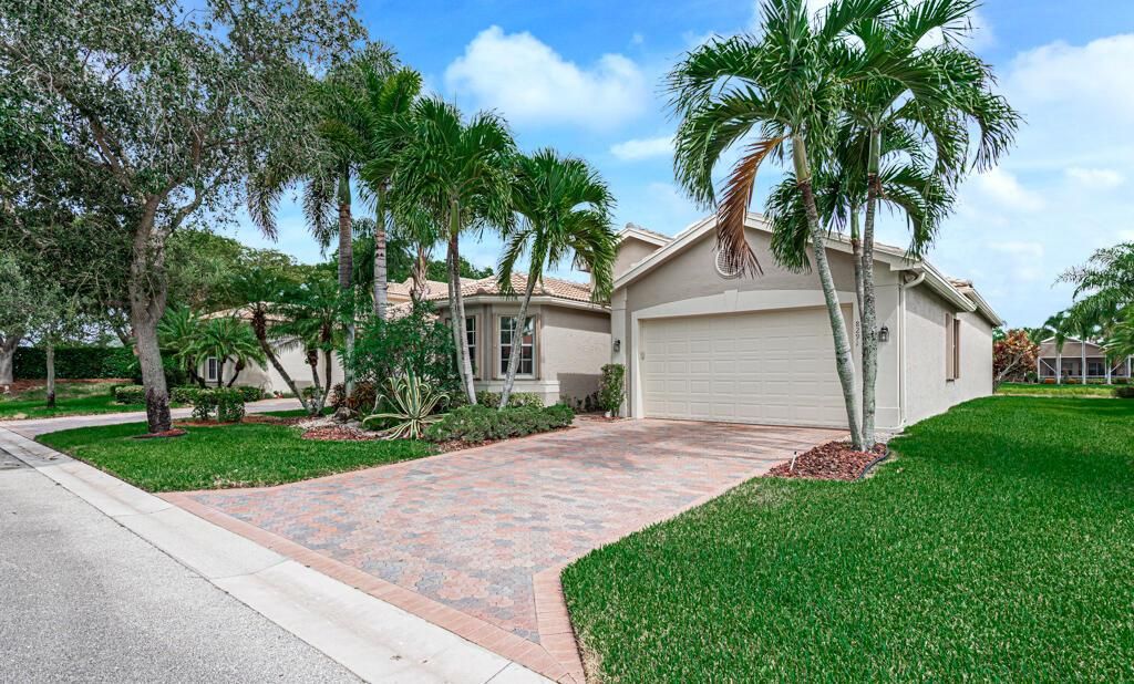 Photo of 8291 Seahorse Cove Boulevard Blvd, Lake Worth Beach, FL 33467 (MLS # R10821675)