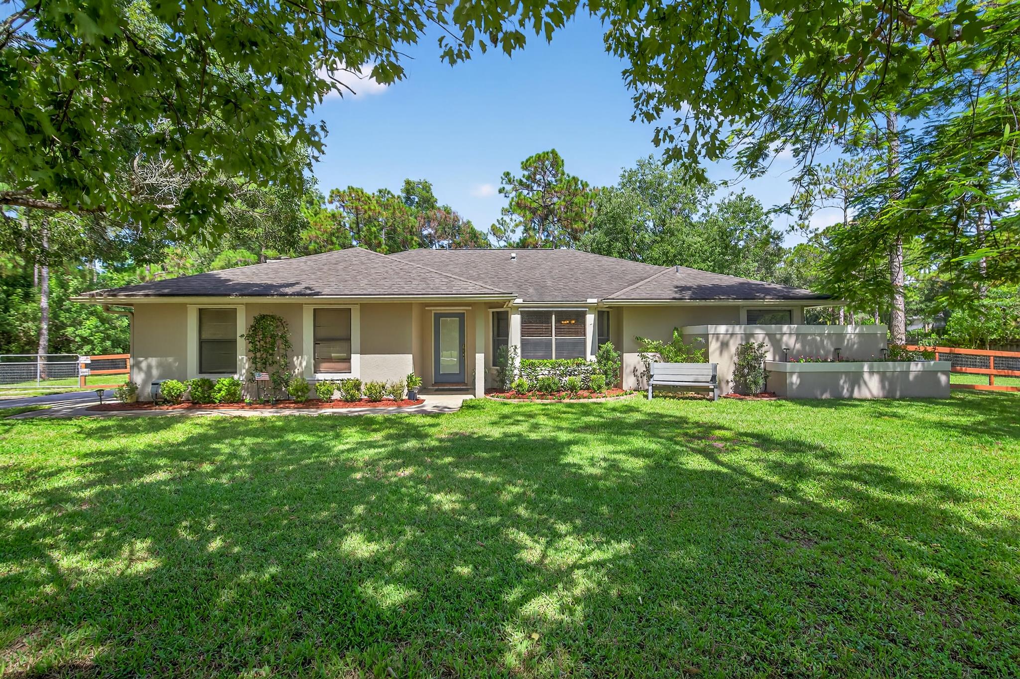 Beautiful Home nestled in the very sought out Jupiter Farms. 1.25 Acre of land to raise children or for gardening and animals! Original Owners, Home filled with much love and many beautiful memories! Washer not included.