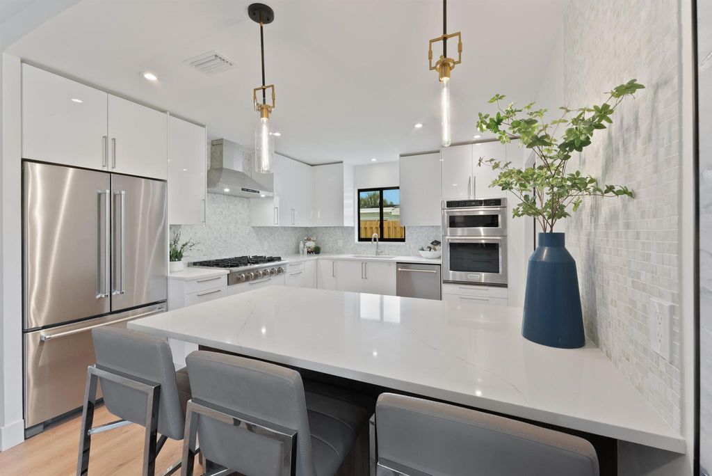 Photo of 460 NE 37th Street NE, Boca Raton, FL 33431 (MLS # R11080341)