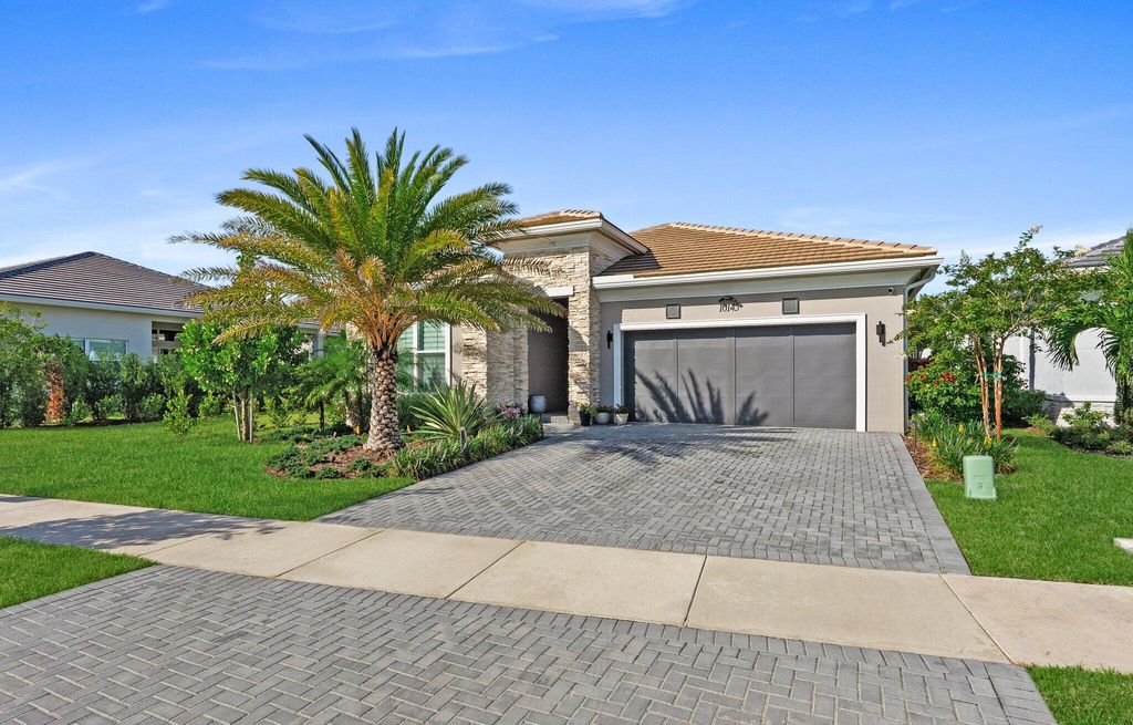 Photo of 10145 Timber Creek Way, Palm Beach Gardens, FL 33412 (MLS # B26044328)