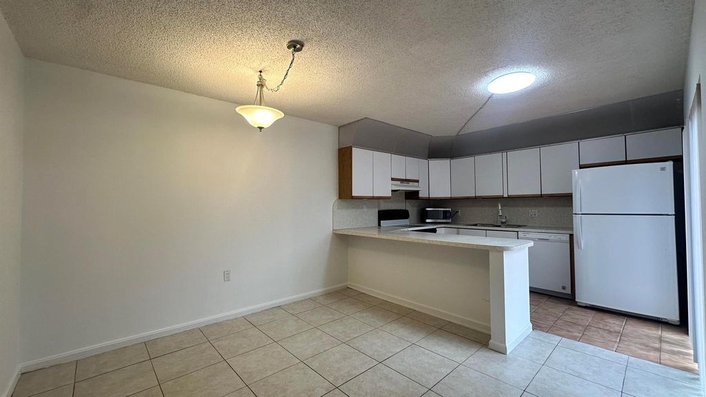 Photo of 501 5th Court, Palm Beach Gardens, FL 33410 (MLS # R11047812)