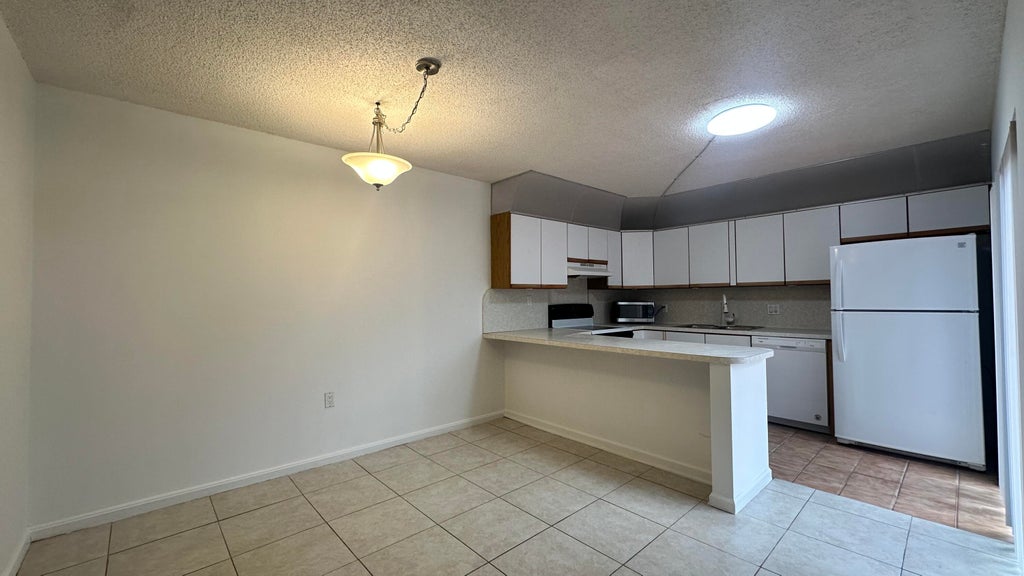 Photo of 501 5th Court, Palm Beach Gardens, FL 33410 (MLS # R11047812)