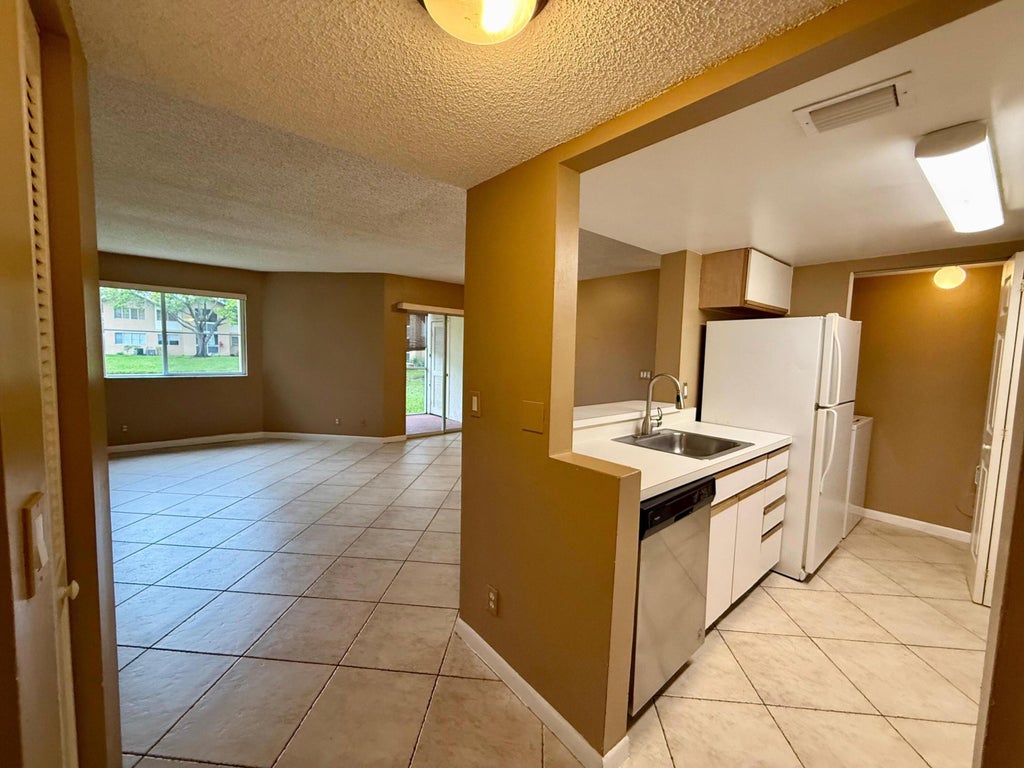 Photo of 9799 Westview Drive #Unit 1015, Coral Springs, FL 33076 (MLS # B26004014)