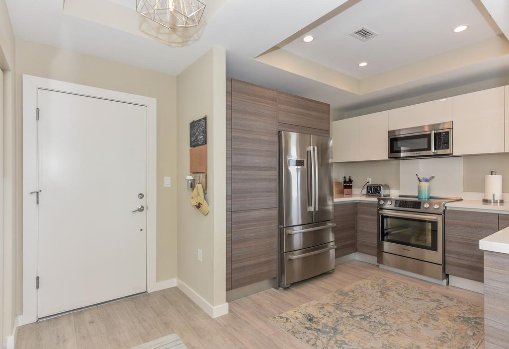 Photo of 51 SE 19th Avenue #401, Deerfield Beach, FL 33441 (MLS # B26016487)