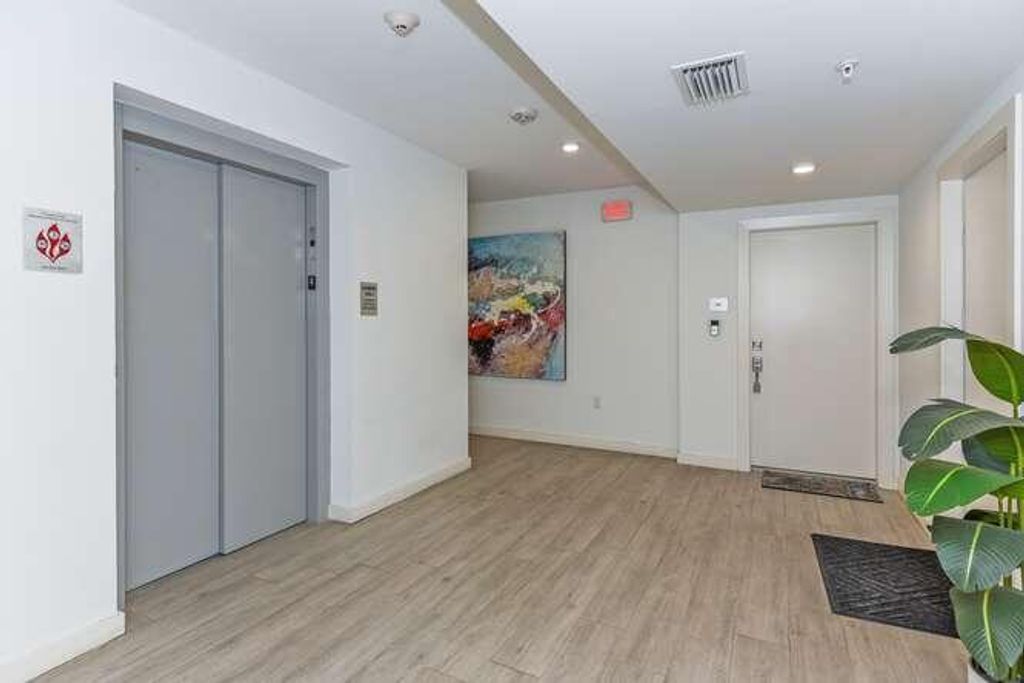 Photo of 51 SE 19th Avenue #401, Deerfield Beach, FL 33441 (MLS # B26016487)