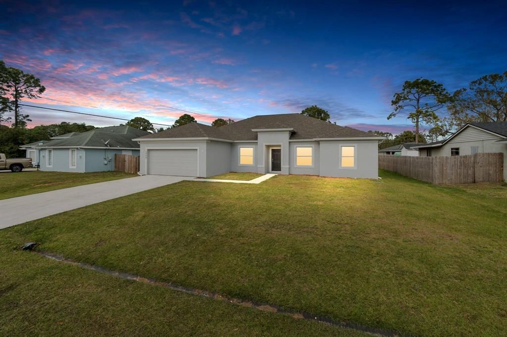 Photo of 1773 SW Commerce Avenue, Port St Lucie, FL 34953 (MLS # R10860545)