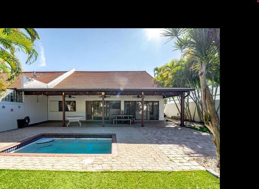 Welcome to 665 Jeffery Street, a waterfront residence in the desirable Porta Bella community of East Boca Raton. This beautifully maintained townhouse offers light-filled living spaces and a spacious layout designed for comfortable South Florida living. Minutes from Mizner Park, the beaches and shopping centers.