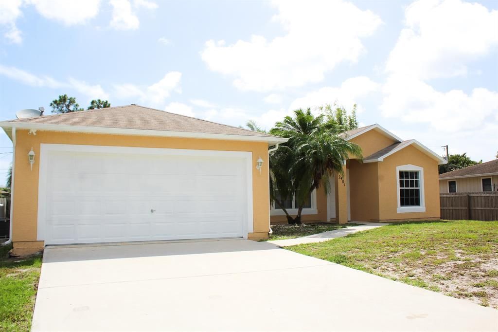 Photo of 2481 SE Camarin Street, Port Saint Lucie, FL 34952 (MLS # R10722669)