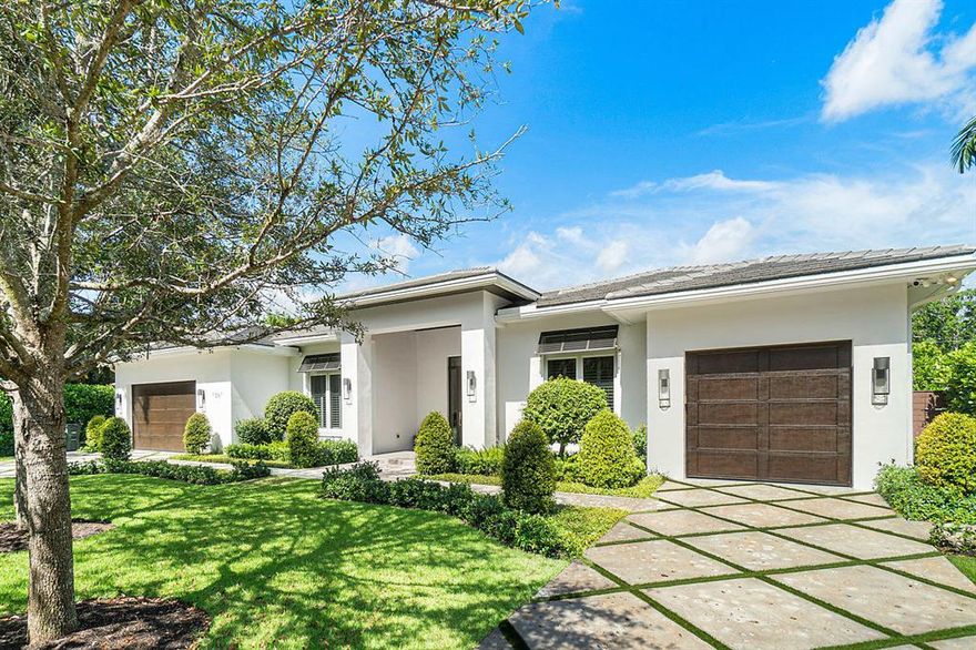 Beautiful One-Story Estate Home, One block to the Beach & Lake Boca Raton, Open-concept Great Room w/12 ft ceilings, Exceptional Custom cabinetry throughout, Approx. 6760 Total Sq Feet, Main House is Six Bedrooms & Five and a Half Bathrooms with a One Bedroom, One Bathroom Pool/Guest House. Magnificent Master Bedroom Retreat, with His/Hers Closets & Fitness/Sitting Area, Amazing Summer Kitchen w/ Marble Stone Accents, Saltwater Heated Pool and gas Kohler generator.