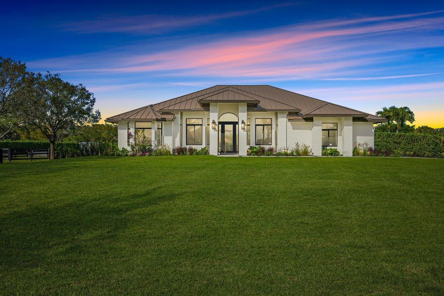 Designer-Perfect Gated Estate on 2+ Acres in Prime Saddle Trail. Welcome to 2920 Appaloosa Trail, a stunning one-of-a-kind residence that will impress the most discerning homeowners and equestrians. This modern showcase was fully remodeled in 2023 with attention to every detail, from the carefully-chosen color palette to the thoughtfully-selected finishes. The fully-fenced property with indoor-outdoor entertaining is ideal for the equestrian lifestyle. The dramatic great room boasts an effortless flow, creating a lovely environment for everyday living. An open-concept kitchen will be the heart of the home, showcasing custom-built white-oak cabinetry, top-of-the-line Monogram appliances, a six-burner gas stove, large hidden walk-in pantry, quartz countertops, and a large center island.