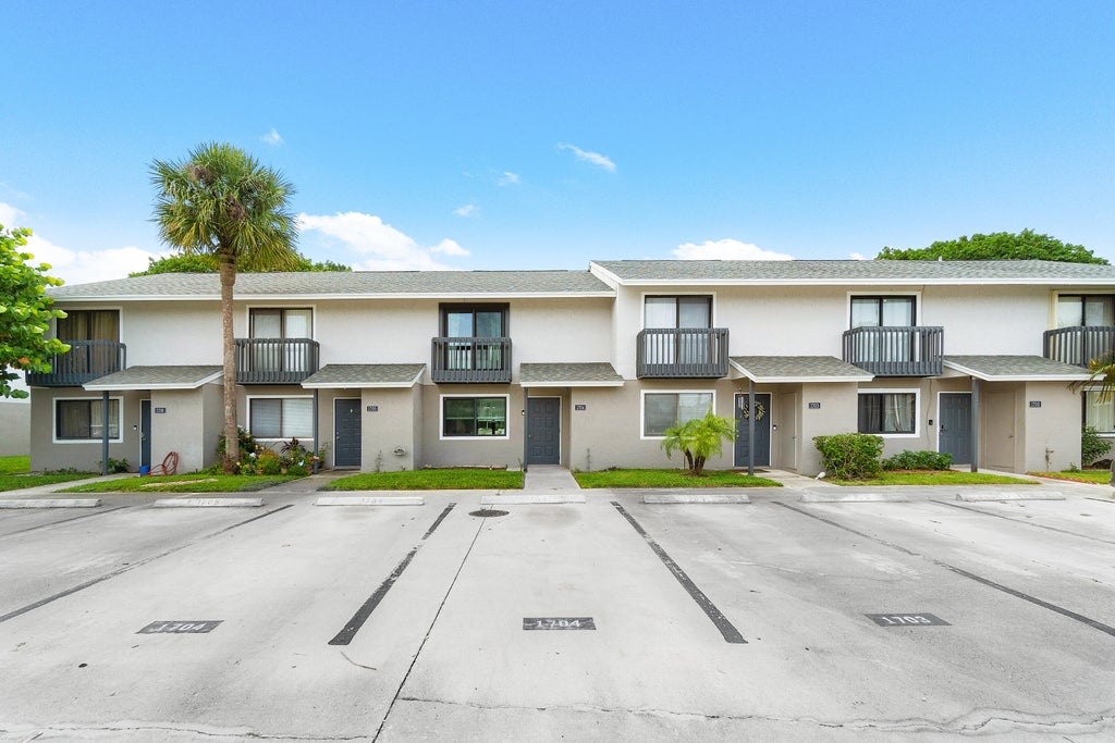 Photo of 1704 Wharf Lane, Greenacres, FL 33463 (MLS # R11003910)