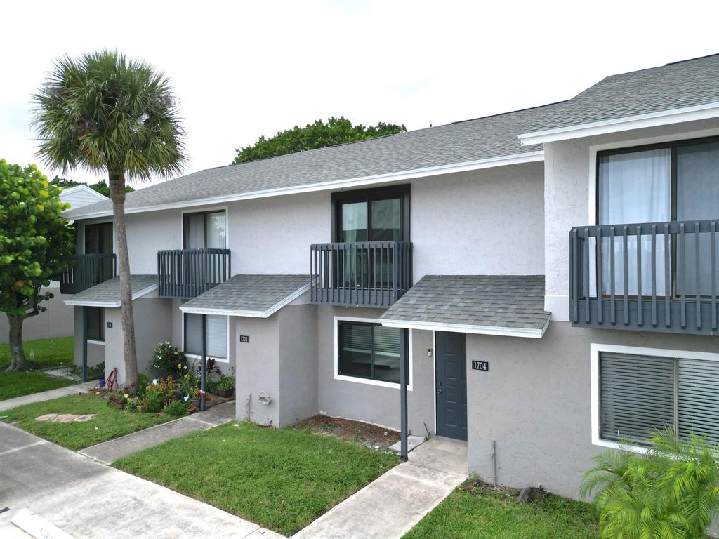 Photo of 1704 Wharf Lane, Greenacres, FL 33463 (MLS # R11003910)