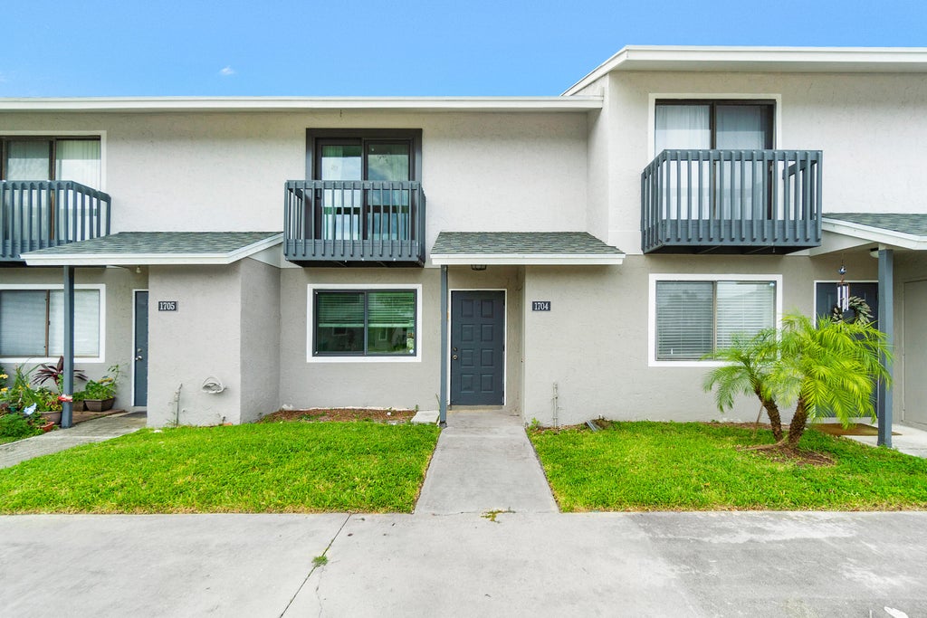 Photo of 1704 Wharf Lane, Greenacres, FL 33463 (MLS # R11003910)