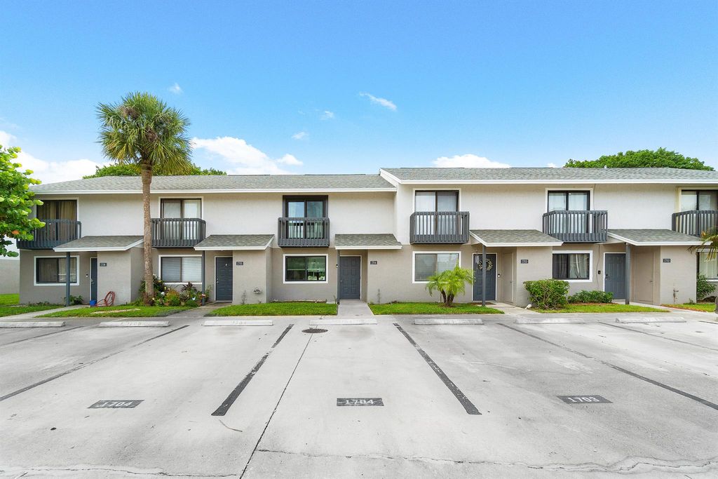 Photo of 1704 Wharf Lane, Greenacres, FL 33463 (MLS # R11003910)