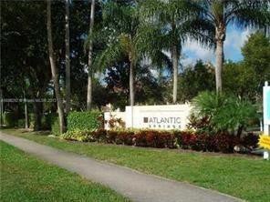 Photo of 11225 W Atlantic Boulevard #101, Coral Springs, FL 33071 (MLS # F10552079)