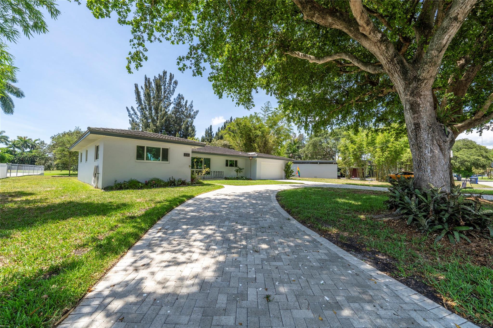 Beautiful spacious fully renovated 3/3 home in Hollywood located on quiet street in Park East neighborhood. Great for professionals who work from home. It features a charming water view across canal of 260-acre Orangebrook Golf Course, with Landlord’s orchid garden next door. Restored terrazzo floors throughout, completely new kitchen with stainless steel appliances; ceiling fans, plenty of closet space; 2 car garage with separate A/C, washer/dryer, new storage cabinets & workbench. Giant screened in patio. Plenty of parking in circular driveway. No smoking inside or outside the home.