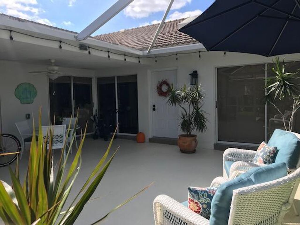 Photo of 9701 Chapman Oak Court, Palm Beach Gardens, FL 33410 (MLS # B26004832)