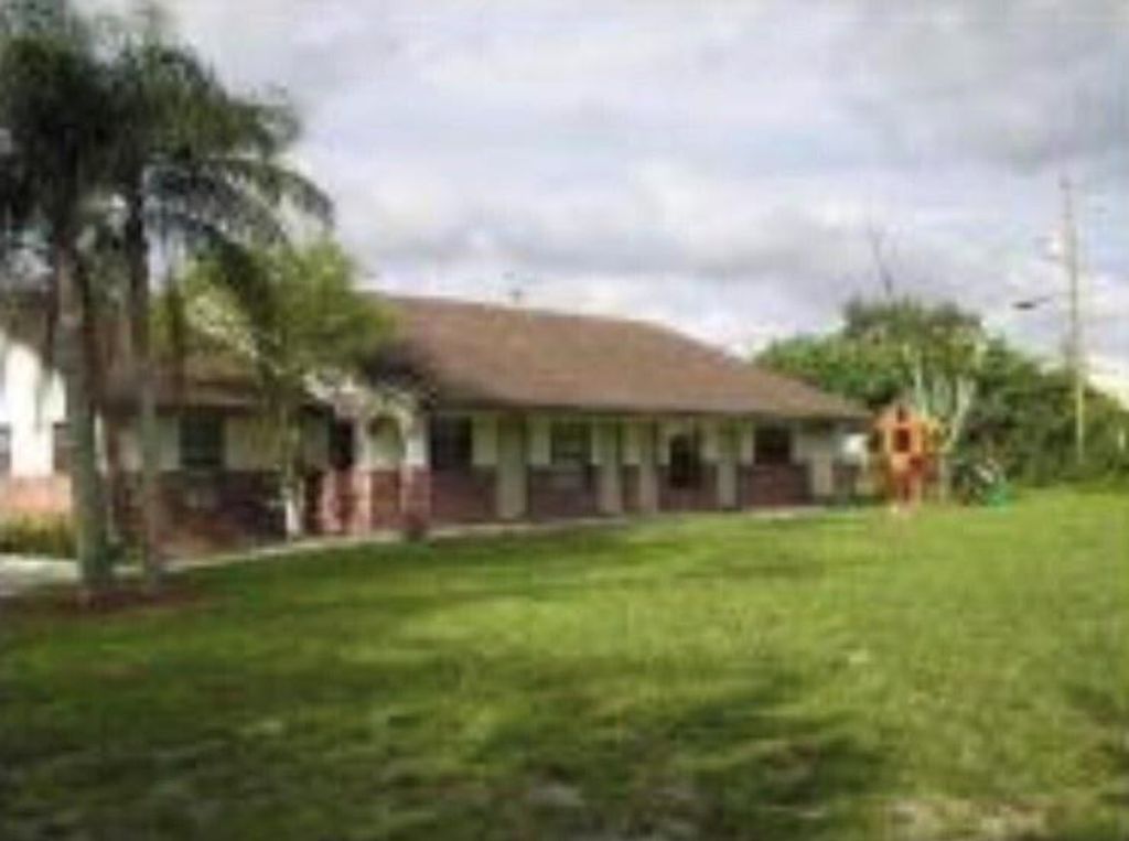 Photo of 5600 NW 76 Place, Coconut Creek, FL 33073 (MLS # R10881566)