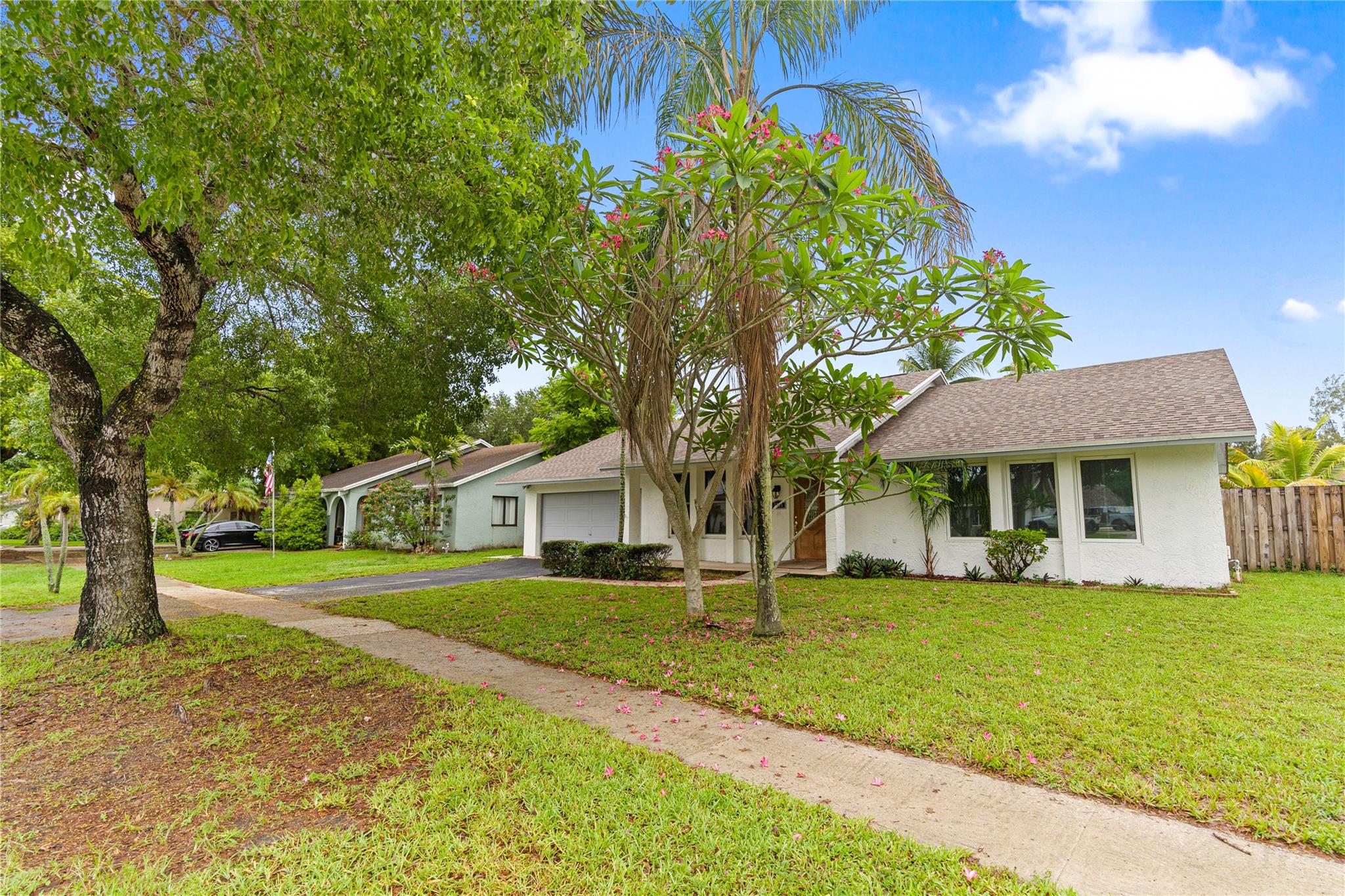 FANTASTIC OPPORTUNITY TO PURCHSE THIS 3 BEDROOM 2 BATH HOME WITH POOL IN DESIRABLE COMMUNITY OF TIMBERLAKE IN COOPER CITY*NEWER ROOF (2022)*PARTIAL HURRICANE IMPACT WINDOWS (FRONT OF THE HOME)*UPDATED KITCHEN WITH WOOD CABINETS, GRANITE COUNTER TOPS AND STAINLESS STEEL APPLIANCES*TILE FLOORS*VAULTED CEILINGS*LAUNDRY ROOM*HIGHLY SOUGHT-AFTER COOPER CITY SCHOOLS*GREAT LOCATION NEXT TO CHRISTIES SCHALFALE PARK & DOG PARK*